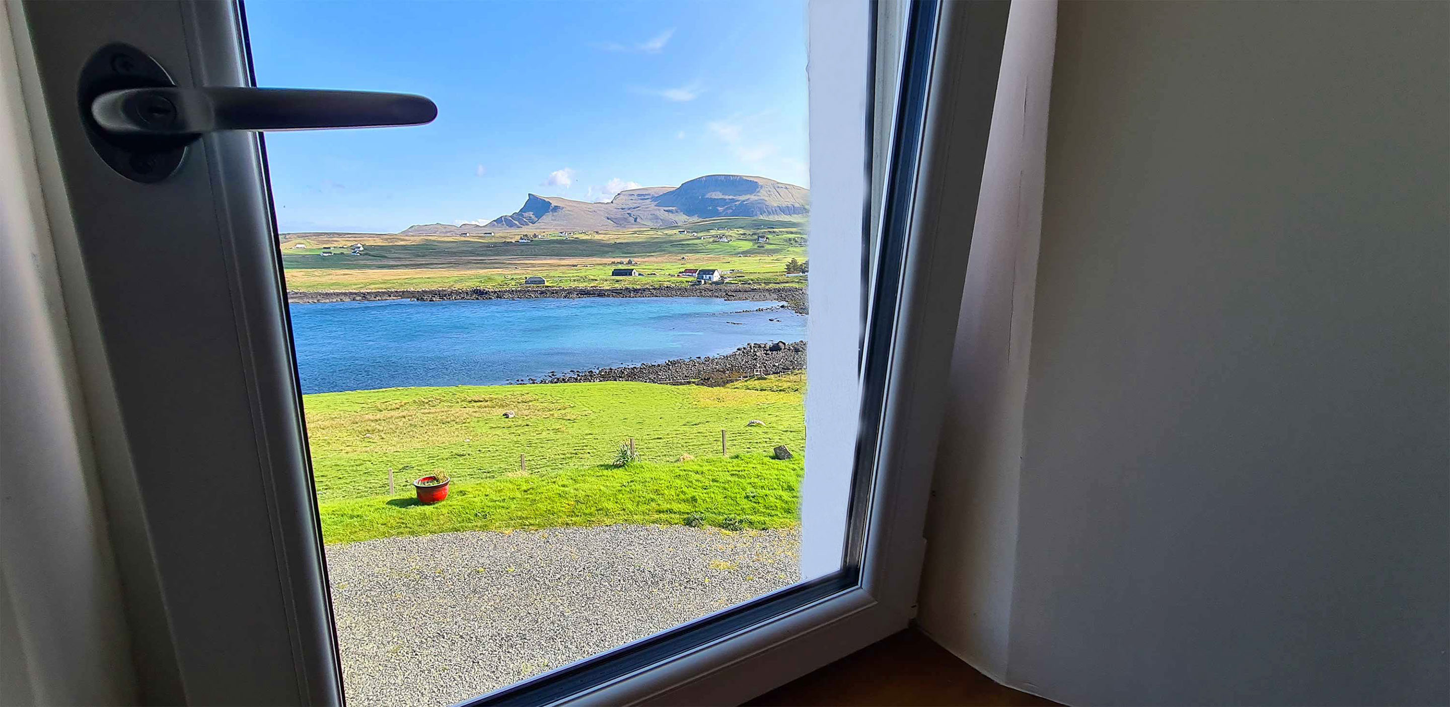 Wake up to stunning sea views of the North of the Isle of Skye at Aird Cottage